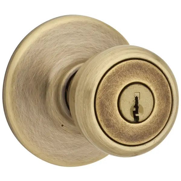 Kwikset Tylo Antique Brass Exterior Entry Door Knob Featuring Microban Antimicrobial Technology